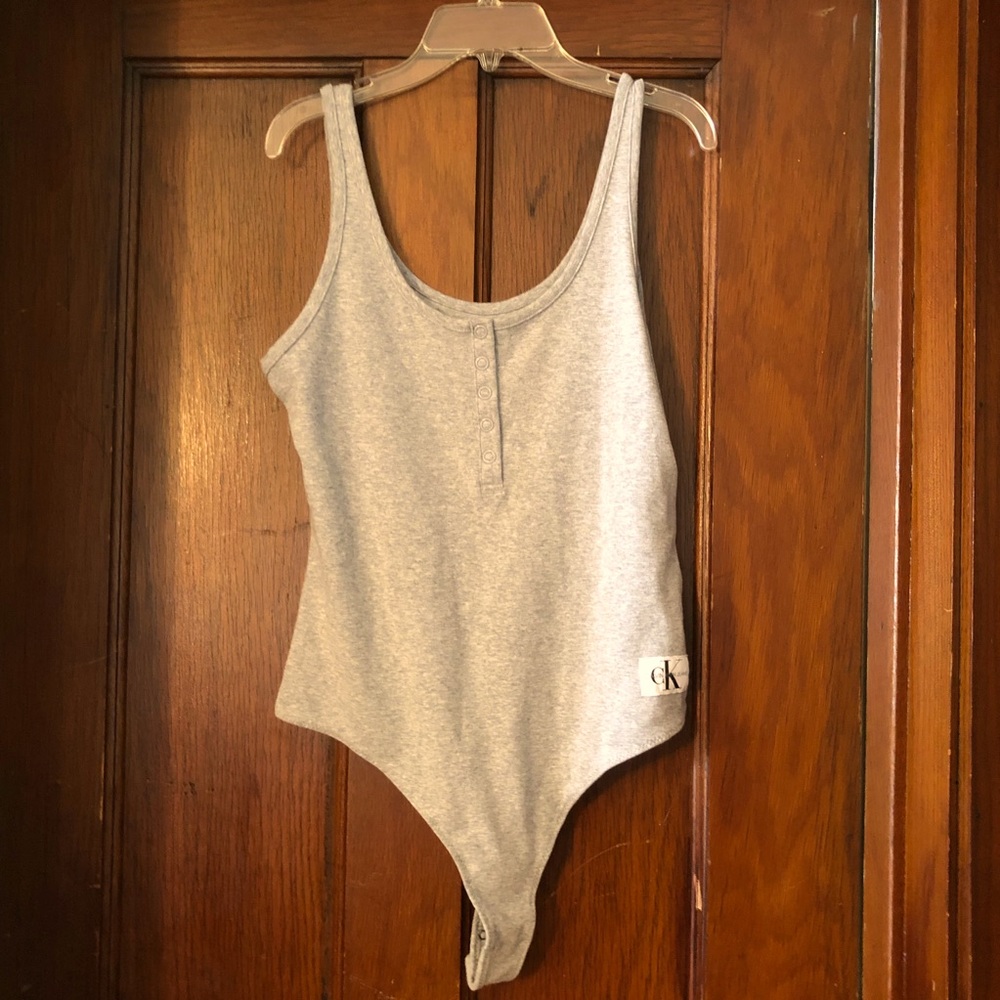 NWT Calvin Klein high cut body suit - size M